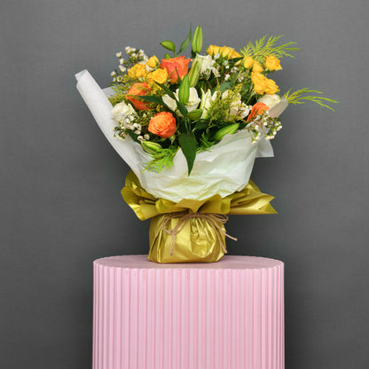 Bouquet of roses and baby rose, lilium, wax flowers, solidago
