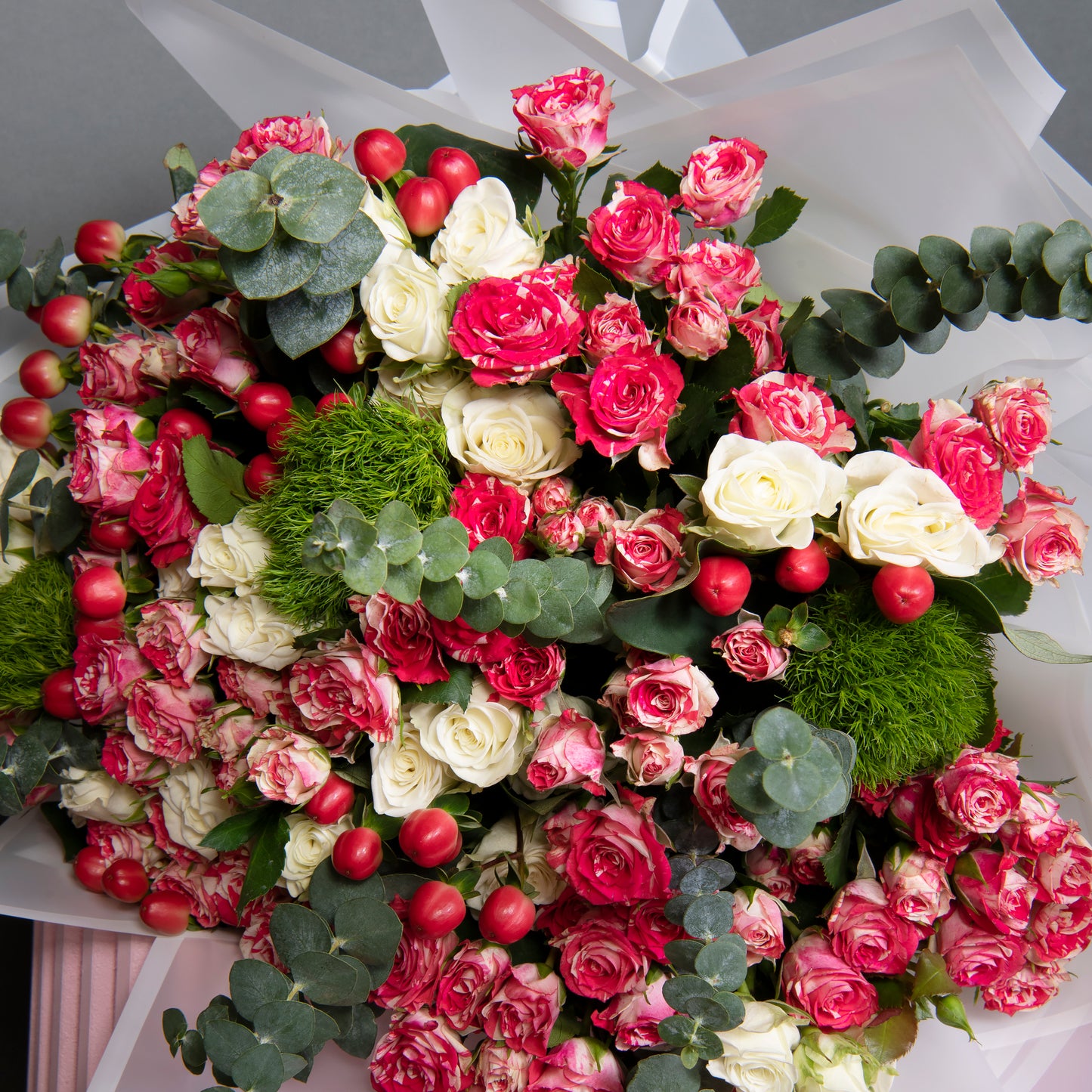 bouquet of roses, hypericum, eucalyptus