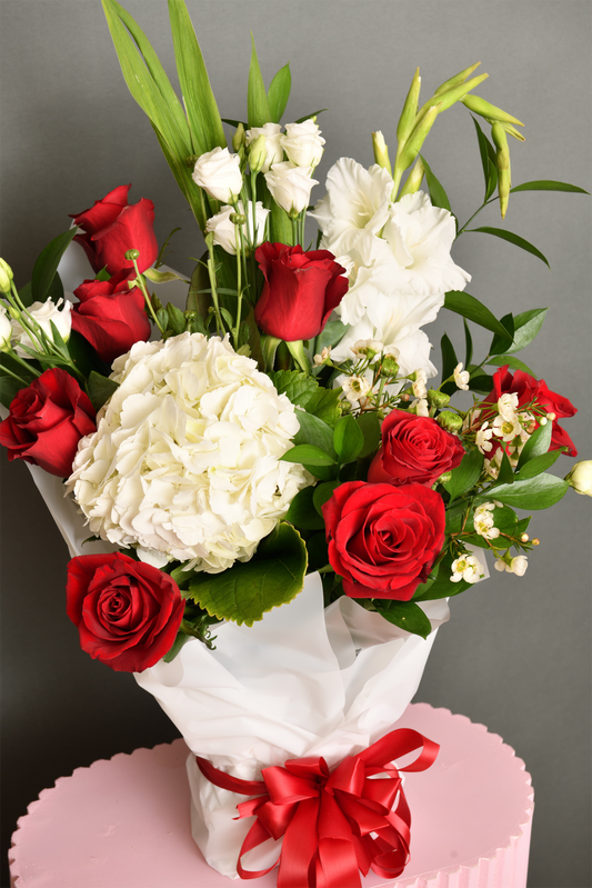 Bouquet of roses, hydrangeas, wax flowers, astomaea, Gladiolus